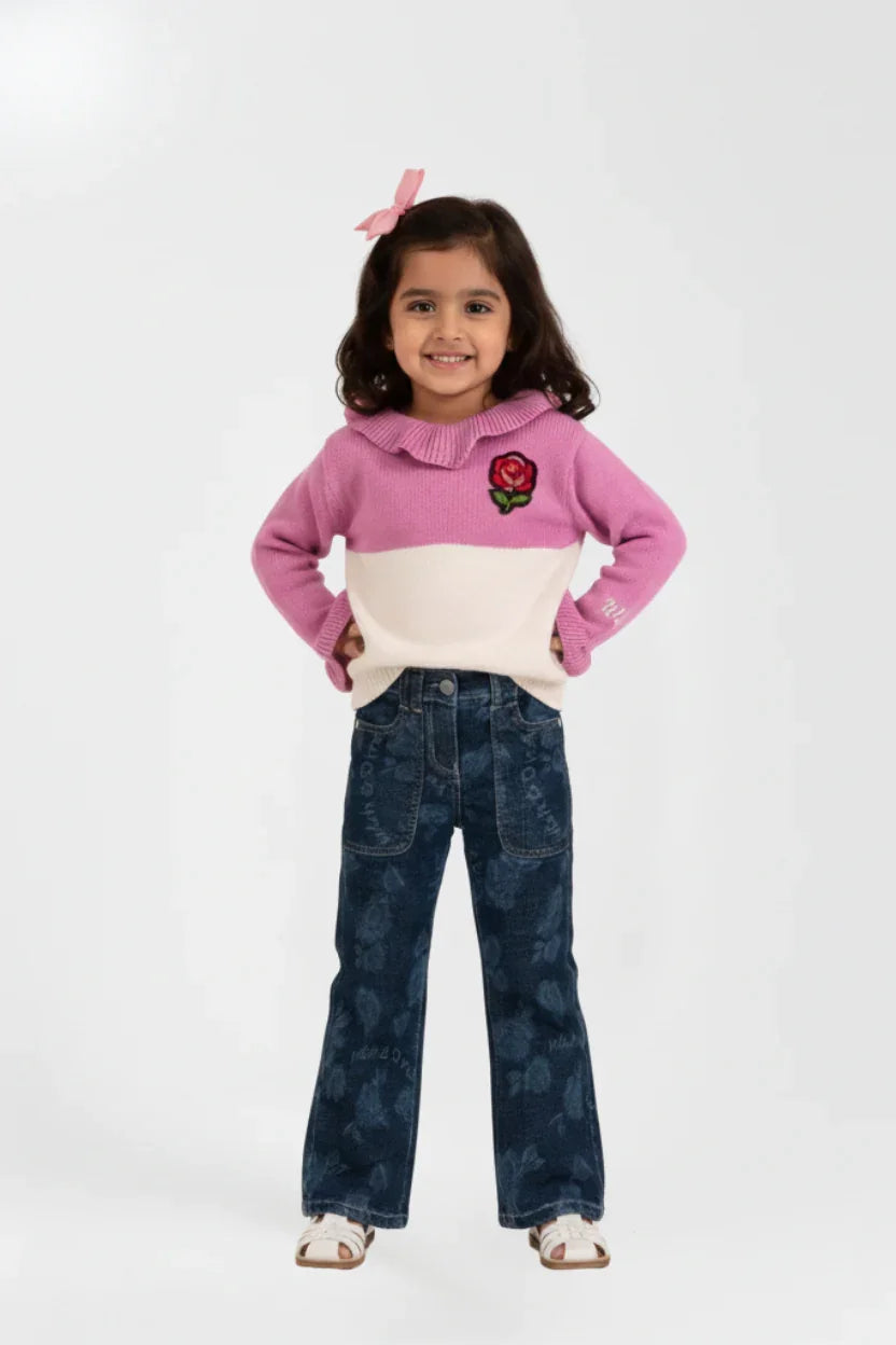 Knitted dual color sweater with ruffle detailing